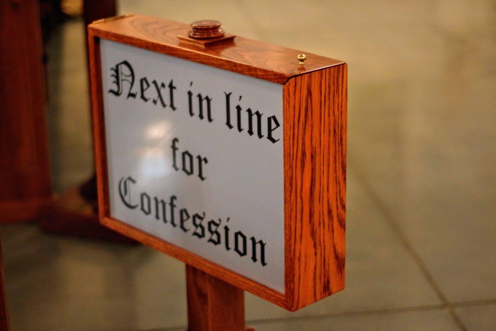 Confession booth sign